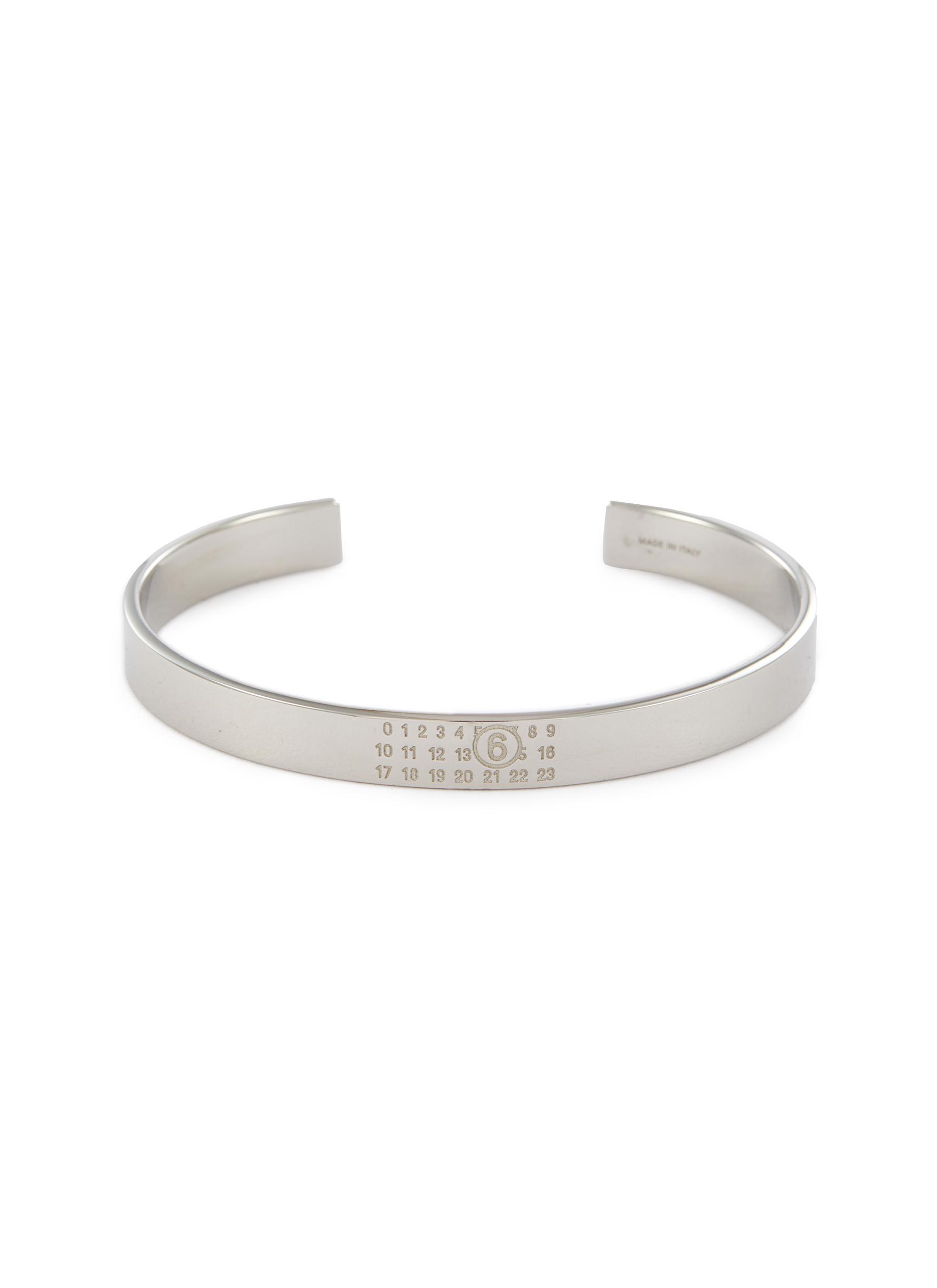 MM6 MAISON MARGIELA | Embossed Logo Brass Cuff — Polished MM6 MAISON MARGIELA | Embossed Logo Brass Cuff — Polished