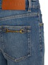  - MO&CO. - Medium Wash Chain Embellished Pocket Wide Leg Jeans