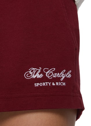  - SPORTY & RICH - The Carlyle Script Disco Shorts
