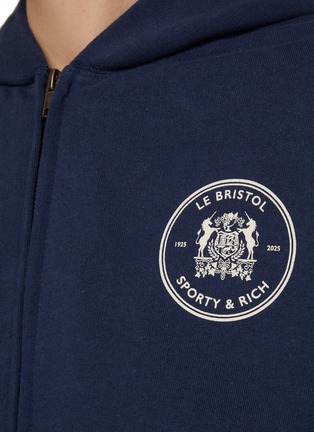 - SPORTY & RICH - Bristol Crest 100th Cropped Zip Up Hoodie