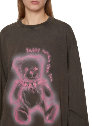  - WE11DONE - Oversized Long Sleeve Teddy Graphic Top