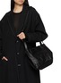 Front View - Click To Enlarge - DISCORD YOHJI YAMAMOTO BAGS - Medium Draped Tulip Leather Handbag