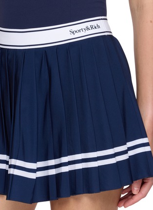 - SPORTY & RICH - Serif Logo Waistband Pleated Mini Skirt