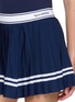  - SPORTY & RICH - Serif Logo Waistband Pleated Mini Skirt