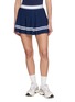 SPORTY & RICH Serif Logo Waistband Pleated Mini Skirt