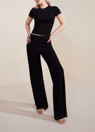 Detail View - Click To Enlarge - SILKY MIRACLE - Nude Flared Leg Trousers — Black/Size M