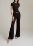Detail View - Click To Enlarge - SILKY MIRACLE - Nude Flared Leg Trousers — Black/Size M