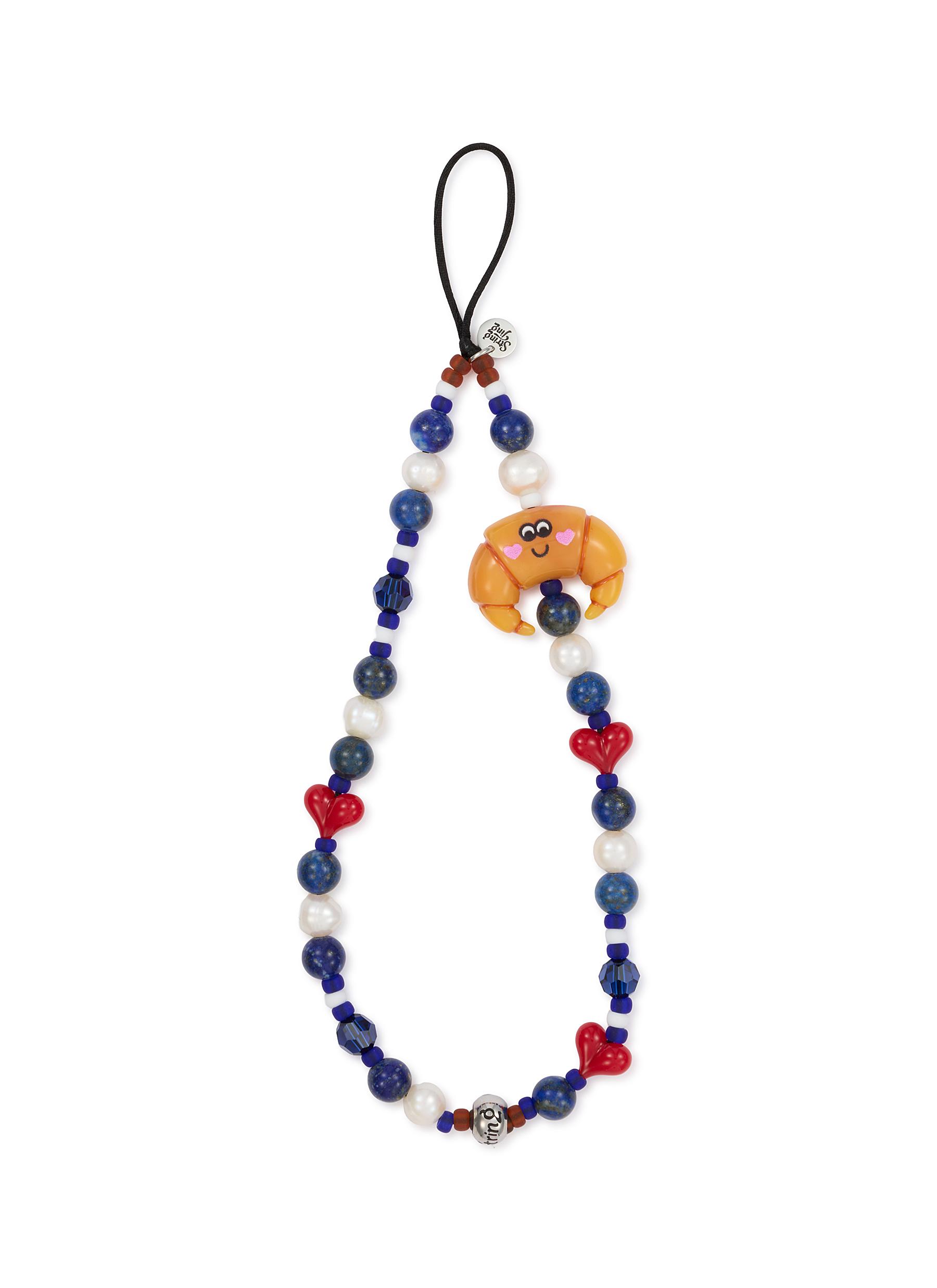 STRING TING | Monsieur Croissant Wristlet Phone Strap | Women