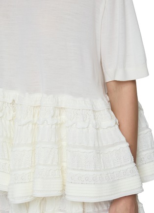  - ALAÏA - Short Sleeve Wool Peplum Top