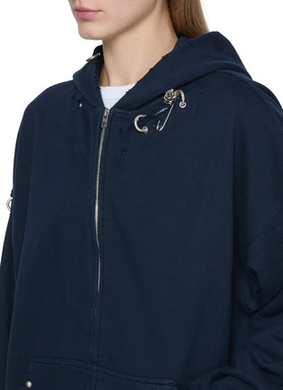  - WE11DONE - Piercing Detail Zip Up Hoodie