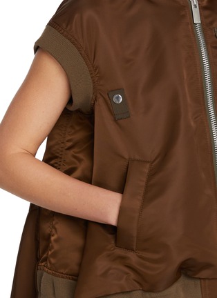  - SACAI - Flared Asymmetrical Hem Bomber Vest
