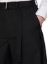  - SACAI - Belted Pleated Curved Leg Wool Blend Pants