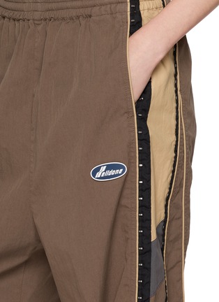  - WE11DONE - Hook Eye Detailed Track Pants