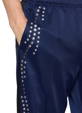  - TOGA VIRILIS - Studded Zip Hem Track Pants