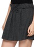  - ASSIGNMENTS - Bow Pleated Mini Skirt