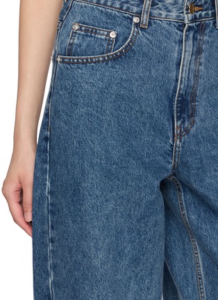  - EENK - Curved Leg Denim Jeans