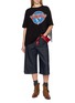 Figure View - Click To Enlarge - DISCOVERED - Fringe Back Graphic Band T-Shirt