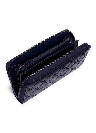 Detail View - Click To Enlarge - GUCCI - Debossed logo leather continental wallet