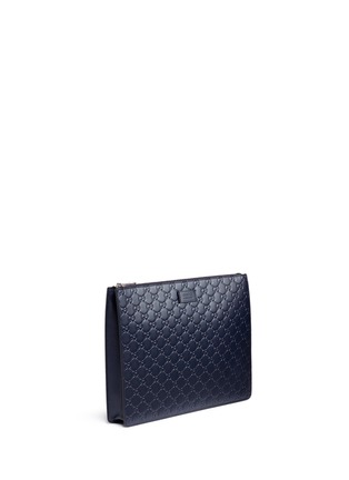 Detail View - Click To Enlarge - GUCCI - Debossed logo leather zip pouch