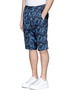 Front View - Click To Enlarge - WHITE MOUNTAINEERING - Leaf print drop crotch shorts