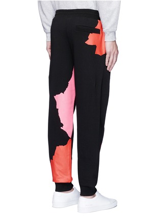 Back View - Click To Enlarge - MC Q - Abstract glyph logo print sweatpants