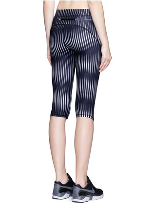Back View - Click To Enlarge - IVY PARK - Kaleidostripe print performance capri leggings