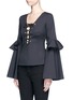 Front View - Click To Enlarge - CAROLINE CONSTAS - 'Anastasia' oversized ruffle sleeve lace-up top