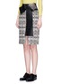 Front View - Click To Enlarge - ALEXANDER MCQUEEN - Leather bow checkerboard tweed skirt