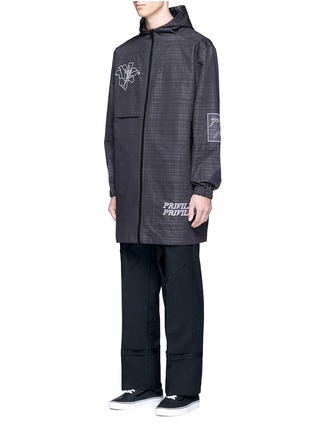 Front View - Click To Enlarge - THE WORLD IS YOUR OYSTER - Floral slogan embroidered check plaid parka