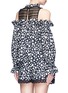 Back View - Click To Enlarge - 72723 - Daisy print balloon sleeve cold shoulder top