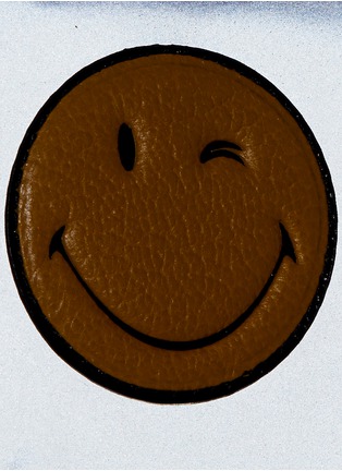  - ANYA HINDMARCH - 'Wink Girlie Stuff' leather smiley reflective nylon pouch