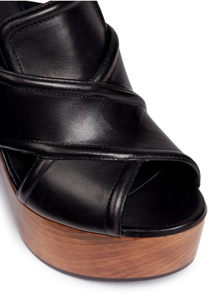 Detail View - Click To Enlarge - SAINT LAURENT - Wooden heel cross vamp leather platform clogs