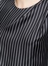 Detail View - Click To Enlarge - MONSE - Asymmetric cold shoulder pinstripe silk shirt