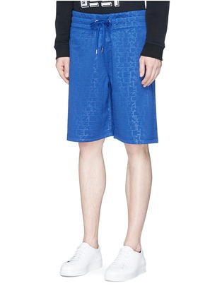 Front View - Click To Enlarge - KENZO - Monogram embossed tech jersey shorts