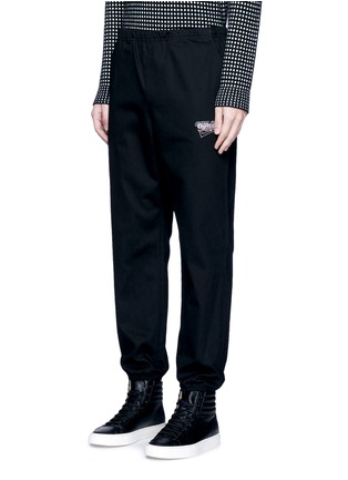 Front View - Click To Enlarge - ALEXANDER WANG - 'GIRLS' embroidered cotton twill jogging pants