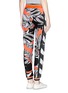 Back View - Click To Enlarge - THE BUNNY JACKET - Feather print perforated leather panel sweatpants