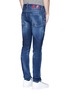 Back View - Click To Enlarge - 71465 - Samurai print distressed jeans
