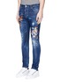 Front View - Click To Enlarge - 71465 - Samurai print distressed jeans