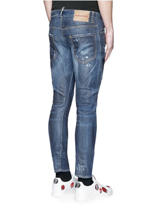 Back View - Click To Enlarge - 71465 - 'Sexy Twist' rip and repair slim fit jeans