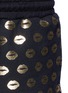 Detail View - Click To Enlarge - MARKUS LUPFER - 'Smacker Lip' foil print sweat shorts