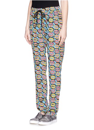 Front View - Click To Enlarge - MARKUS LUPFER - 'Neon Scribble Lip' silk jogging pants