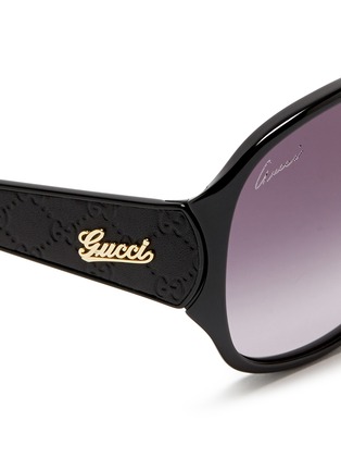 Detail View - Click To Enlarge - GUCCI - Monogram embossed leather temple acetate sunglasses