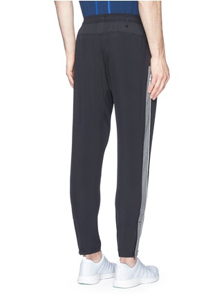 Back View - Click To Enlarge - THE UPSIDE - Contrast outseam cropped performance track pants