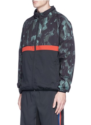 Front View - Click To Enlarge - THE UPSIDE - 'Sketchy Camo' packable hood jacket
