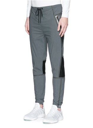 Front View - Click To Enlarge - DYNE - 'Carlson' metallic patch track pants