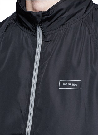 Detail View - Click To Enlarge - THE UPSIDE - 'Night Runner' retractable hood zip vest