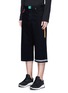 Front View - Click To Enlarge - CHRISTOPHER KANE - Neon tape cropped wide leg denim pants