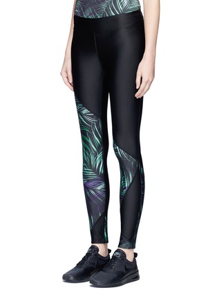 Front View - Click To Enlarge - WE ARE HANDSOME - 'Jag' curved leaf print performance leggings
