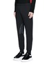 Front View - Click To Enlarge - ALEXANDER MCQUEEN - Perforated leather patch jogging pants