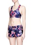 Front View - Click To Enlarge - WE ARE HANDSOME - 'Eden' print active cropped top
